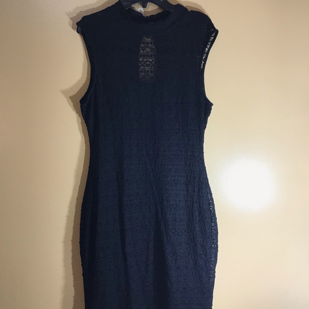 Lace print, solid black dress.